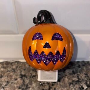 Bath & body Works, white barn, wallflowers light up 24 seven Halloween pumpkin